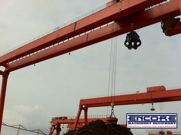 35 ton + 35 ton and 16 ton / 10 ton Heavy Duty Grab Bucket & Magnetic Chuck Electric Gantry Crane For Scrap Yard supplier